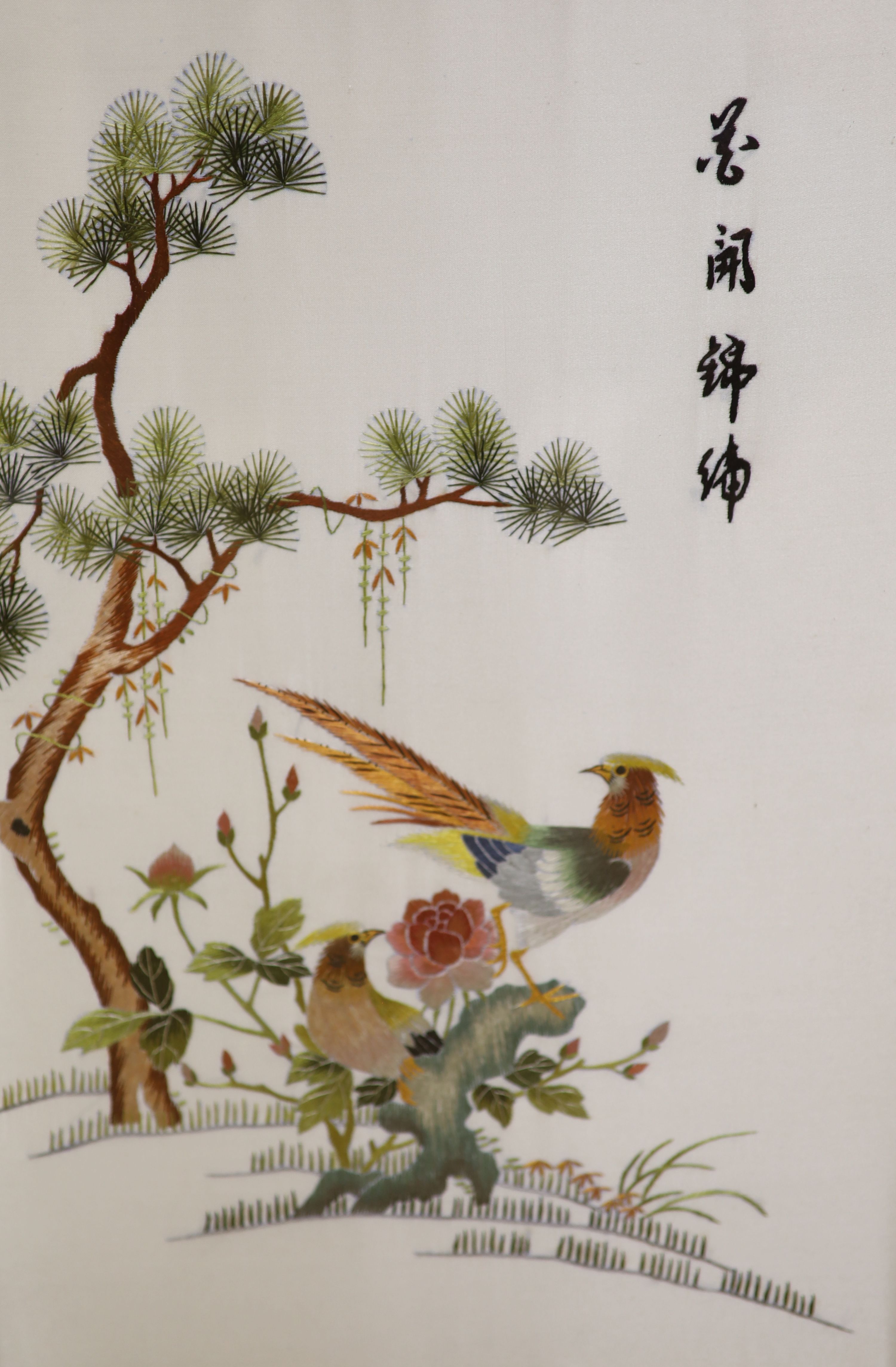A pair of polychrome Chinese embroideries of pheasant, 28 x 43cm